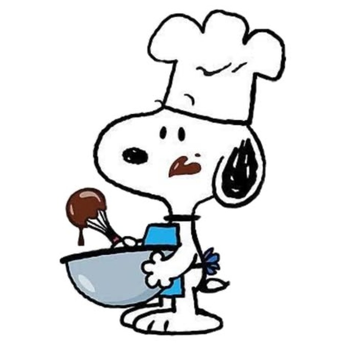 Cartoon beagle in a chef hat stirring a mixing bowl